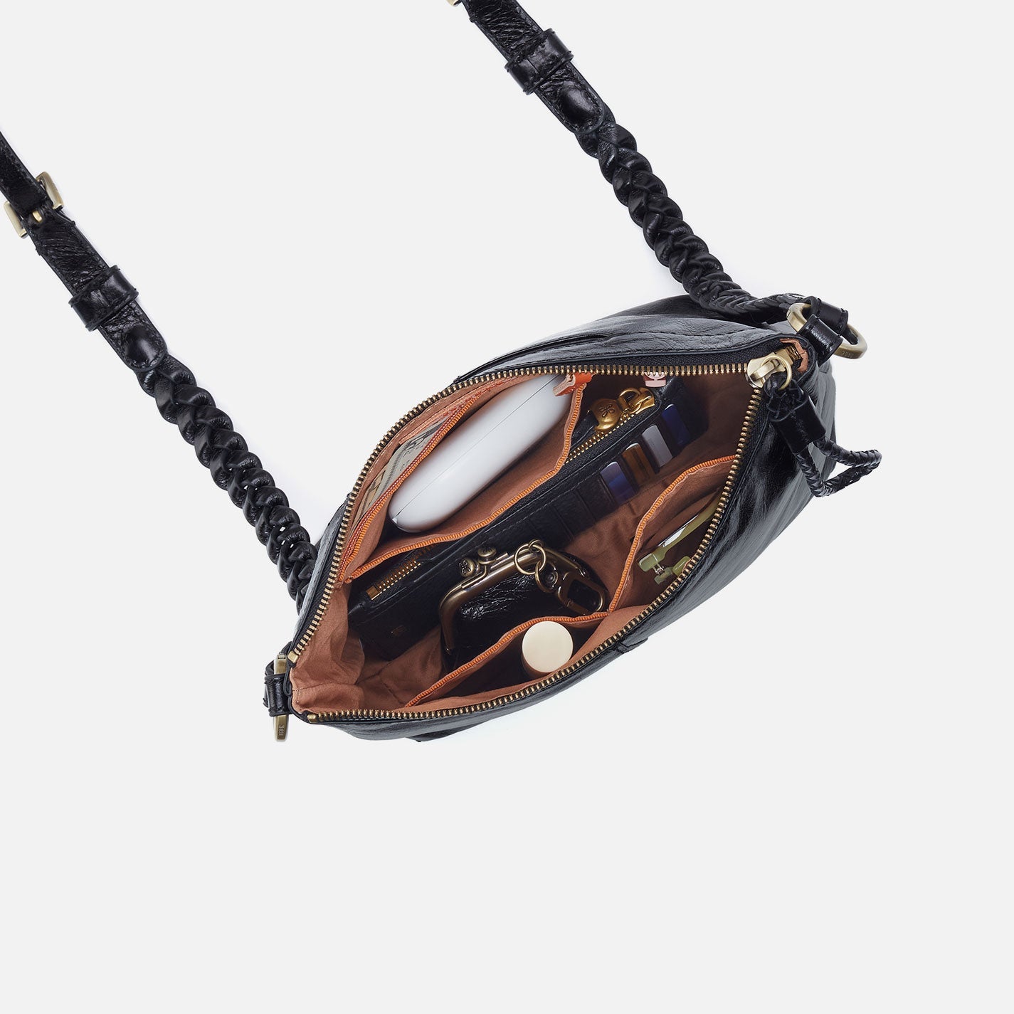 a black hobo medium crossbody against a white background. 