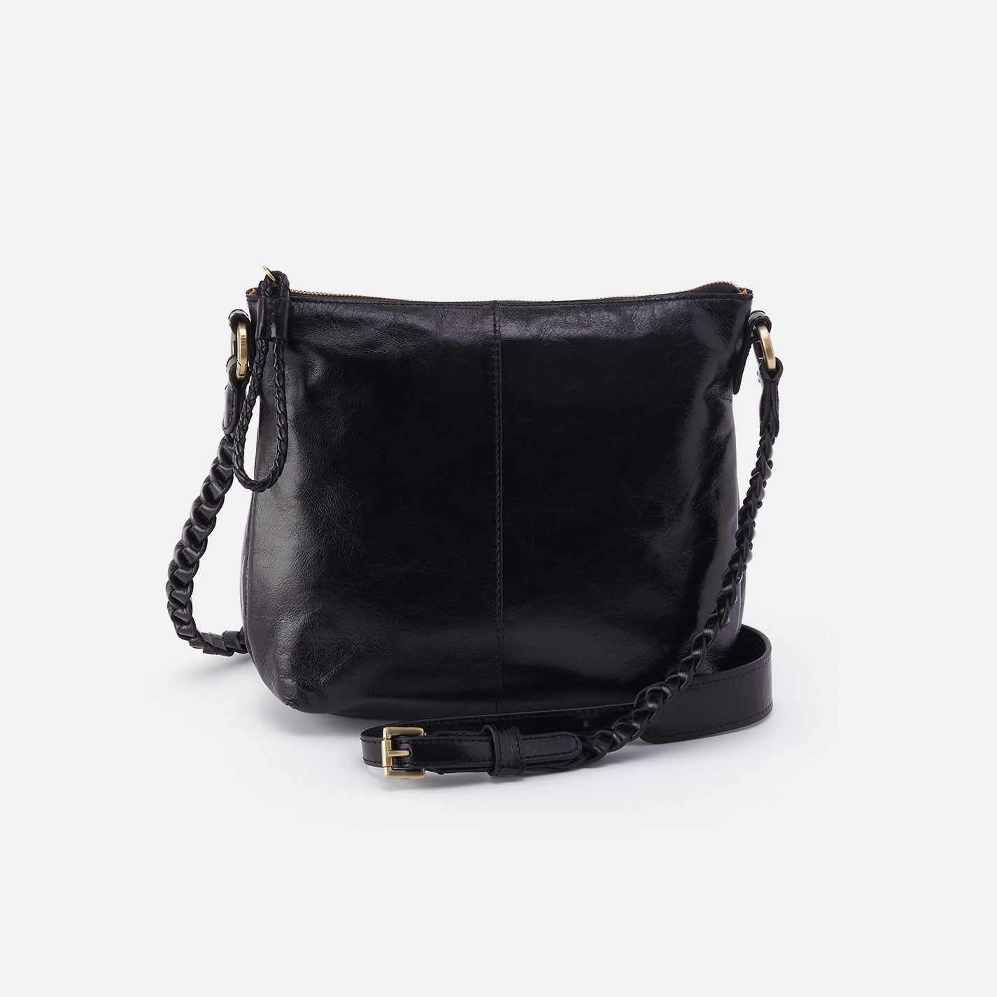 a black hobo medium crossbody against a white background. 