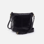 a black hobo medium crossbody against a white background. 