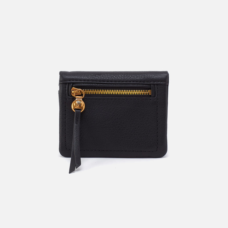 A black leather wallet with a zipper closure and a tassel detail on the front.