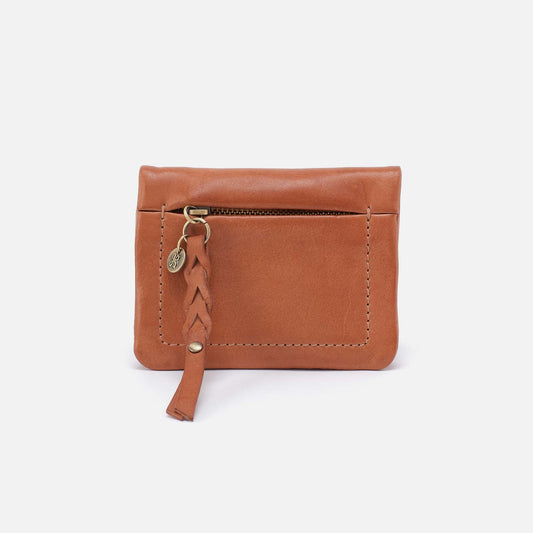Brown leather pouch with a strap on a white background
