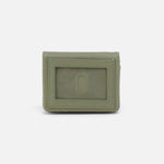 Green wallet with a card holder on a white background