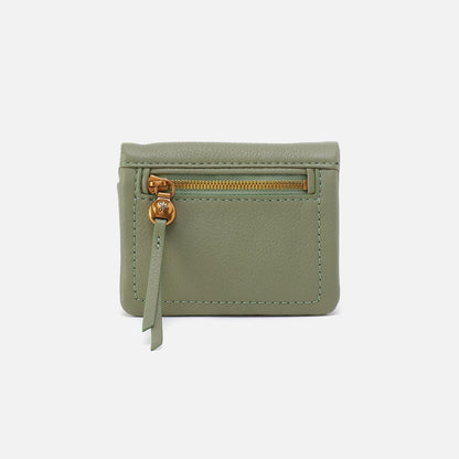 Green wallet with a gold zipper on a white background