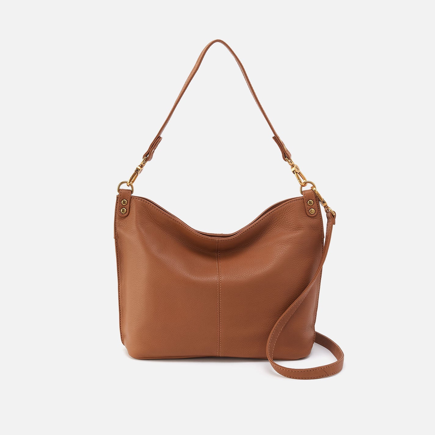 Brown leather handbag with a shoulder strap on a white background