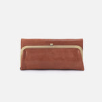 Brown leather clutch bag with gold trim on a white background