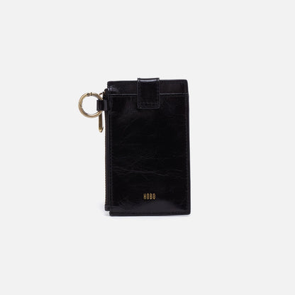 Black wallet with keychain on a white background