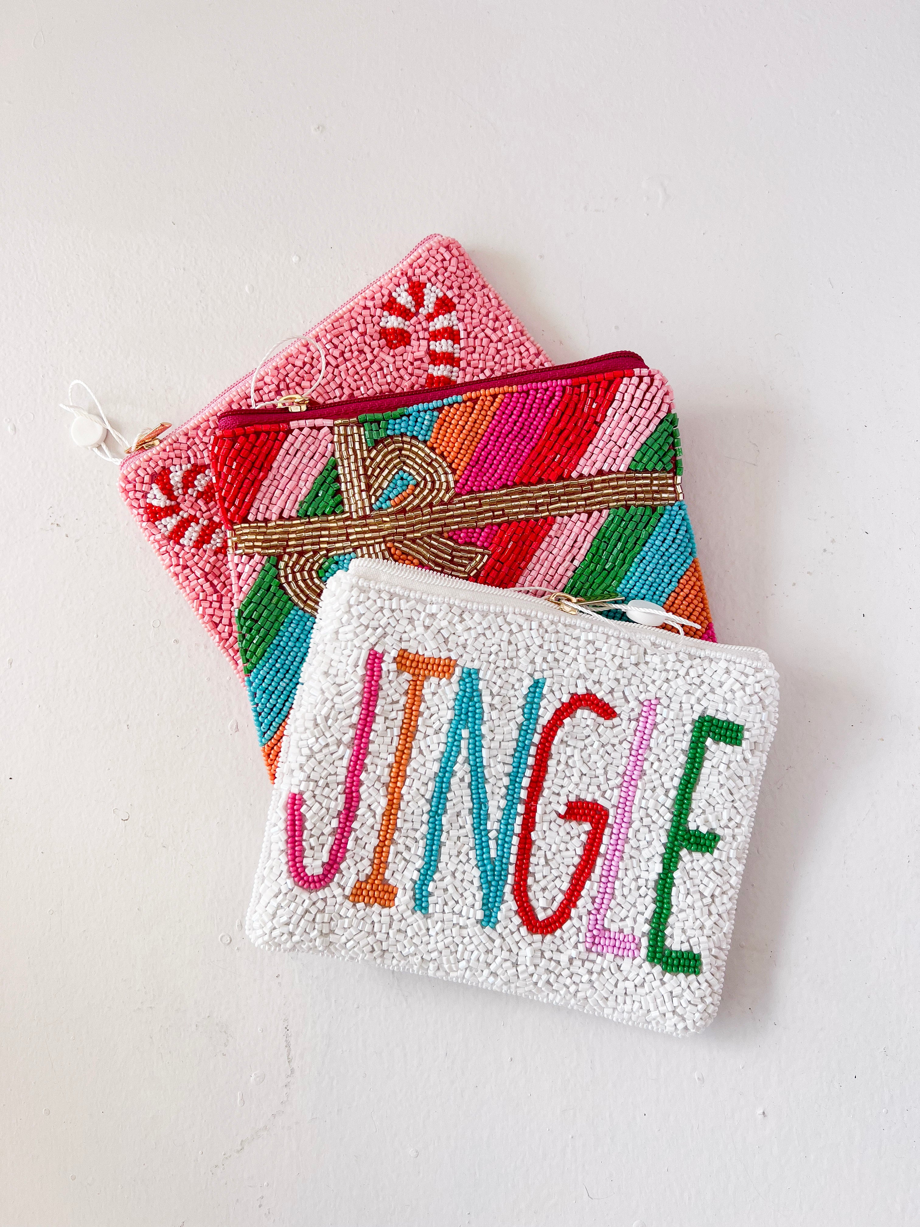 Colorful beaded pouch with 'JINGLE' text on a white background