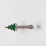 Spoon with Christmas tree design and 'Holiday Delights' text on a white background