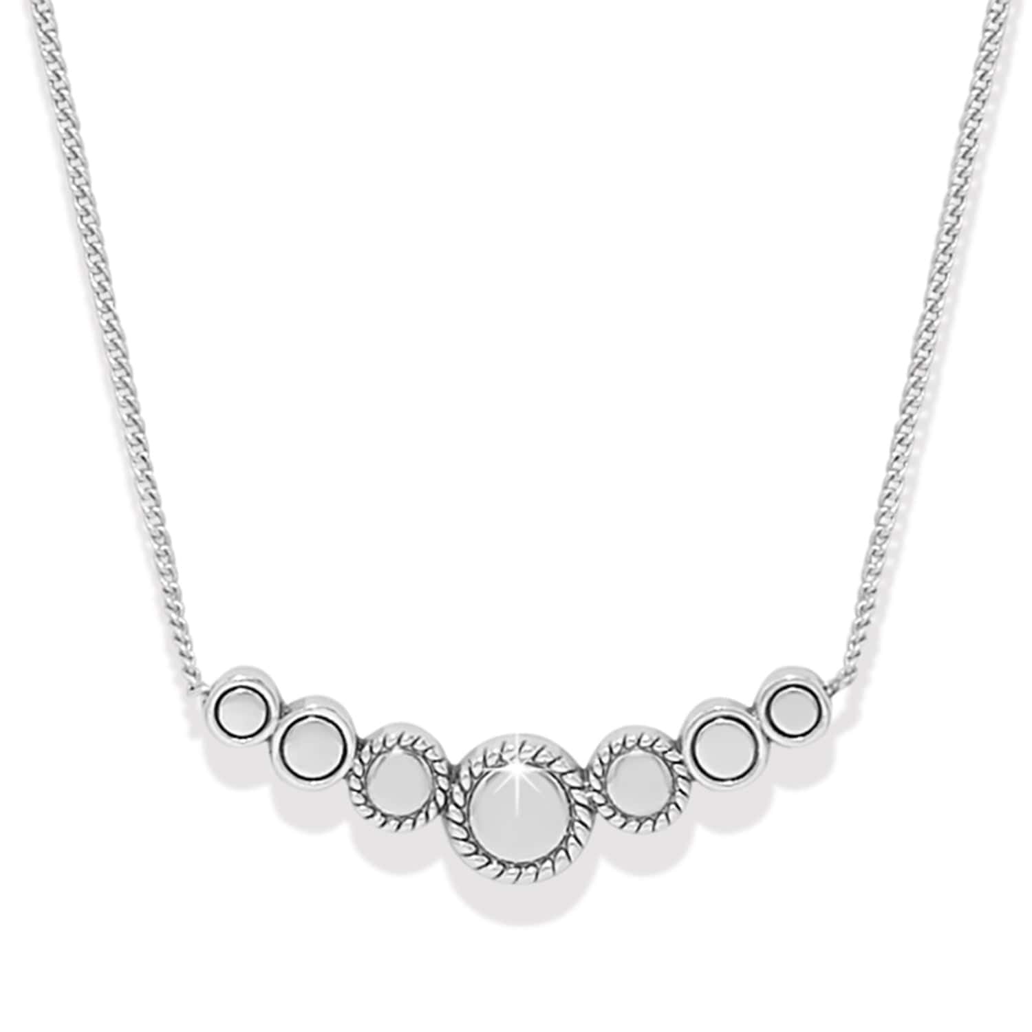 Silver necklace with circular pendants on a white background