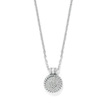 Silver necklace with a round pendant on a white background