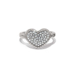 Heart-shaped silver ring with embedded stones on a white background