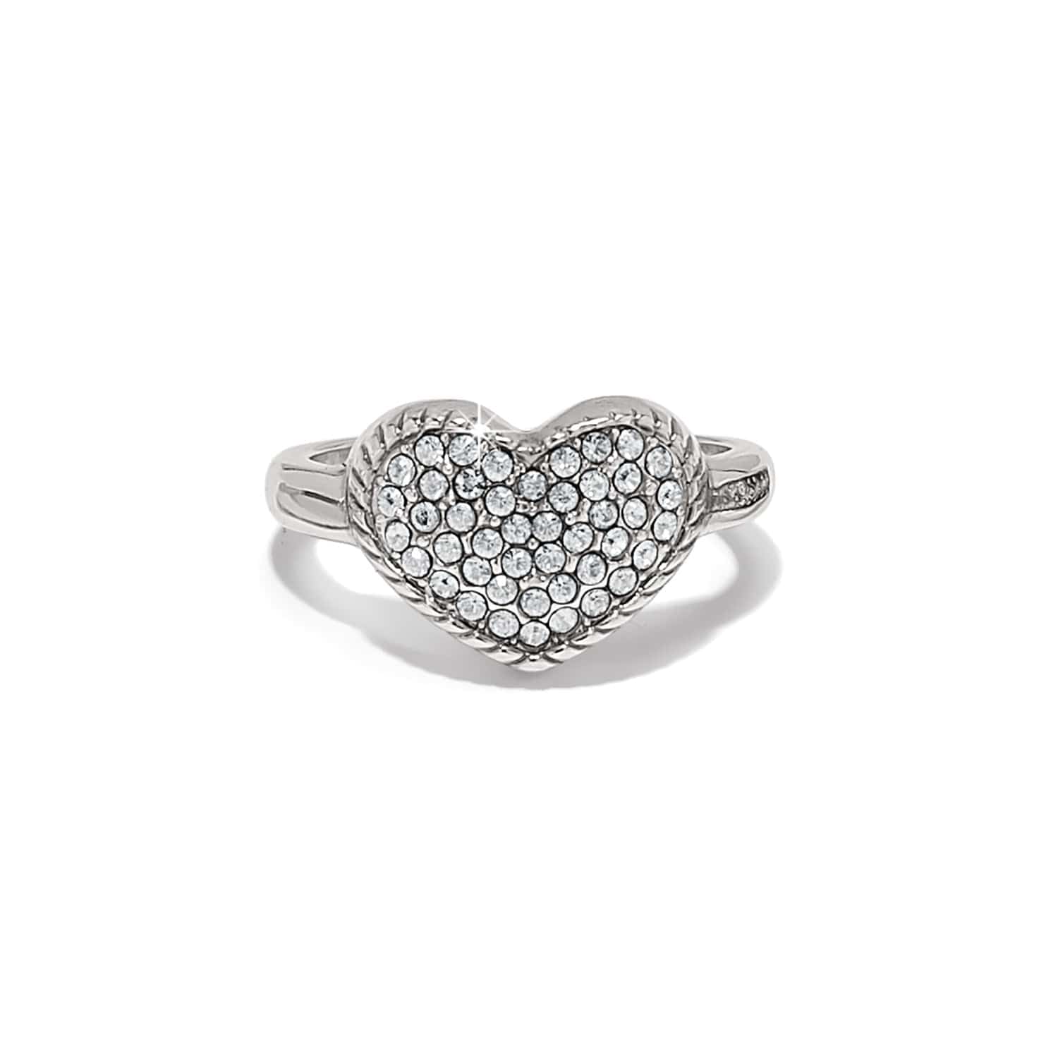 Heart-shaped silver ring with embedded stones on a white background