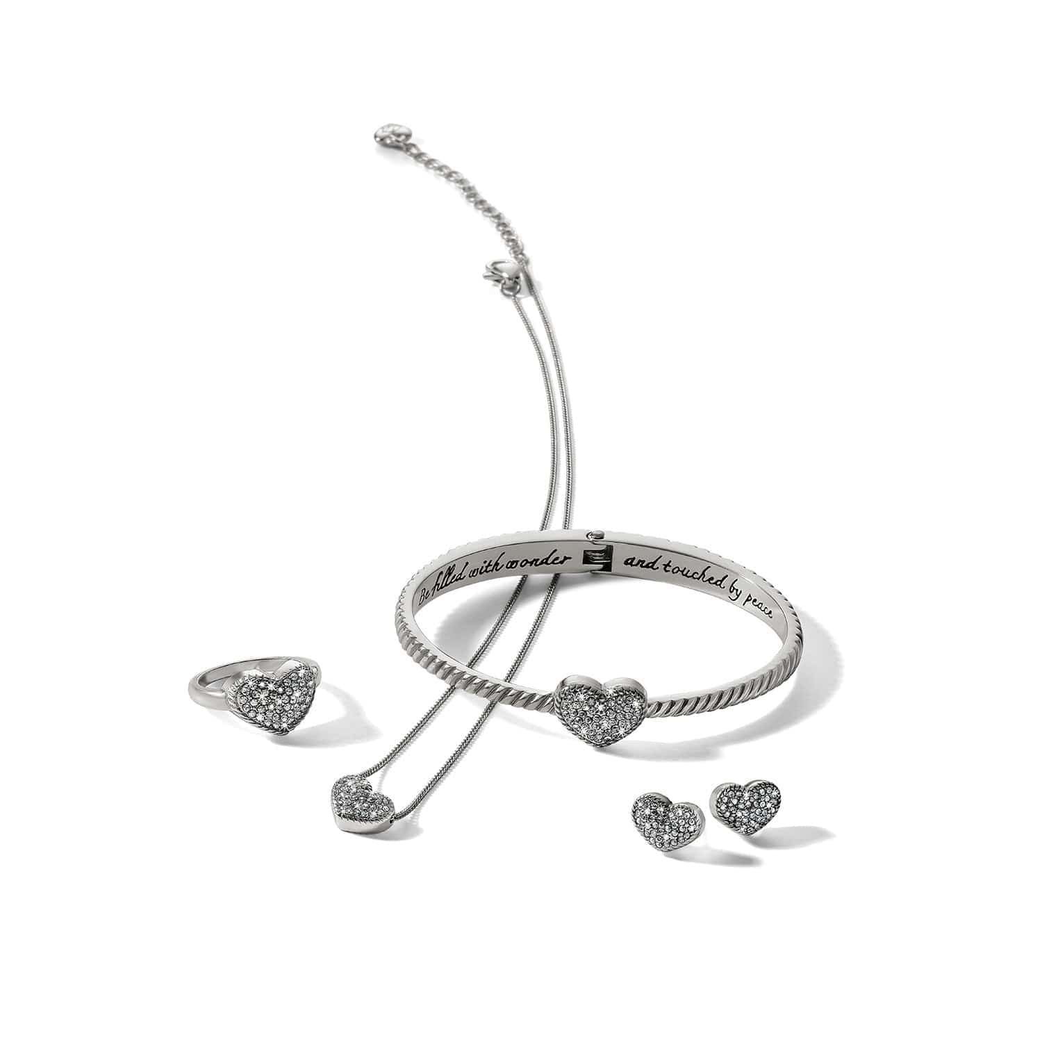 Silver bracelet and earrings set on a white background