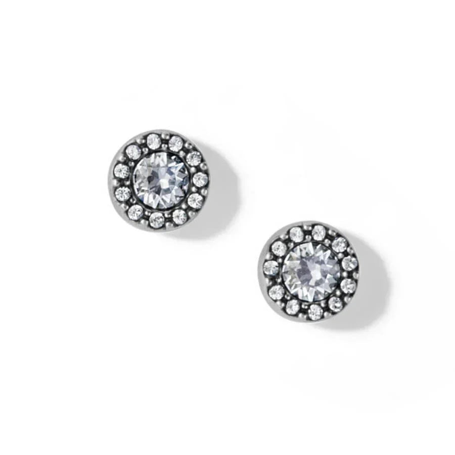 A pair of silver post earrings with a central cubic zirconia surrounded by smaller clear crystals.