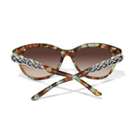 Sunglasses with tortoiseshell frame and chain detail on a white background
