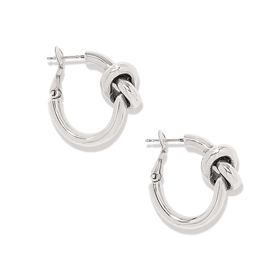 Silver hoop earrings with knot design on a white background