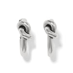 Pair of silver knot earrings on a white background