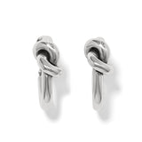 Pair of silver knot earrings on a white background