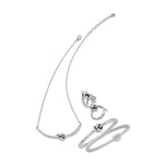 Silver necklace, bracelet, and ring set on a white background