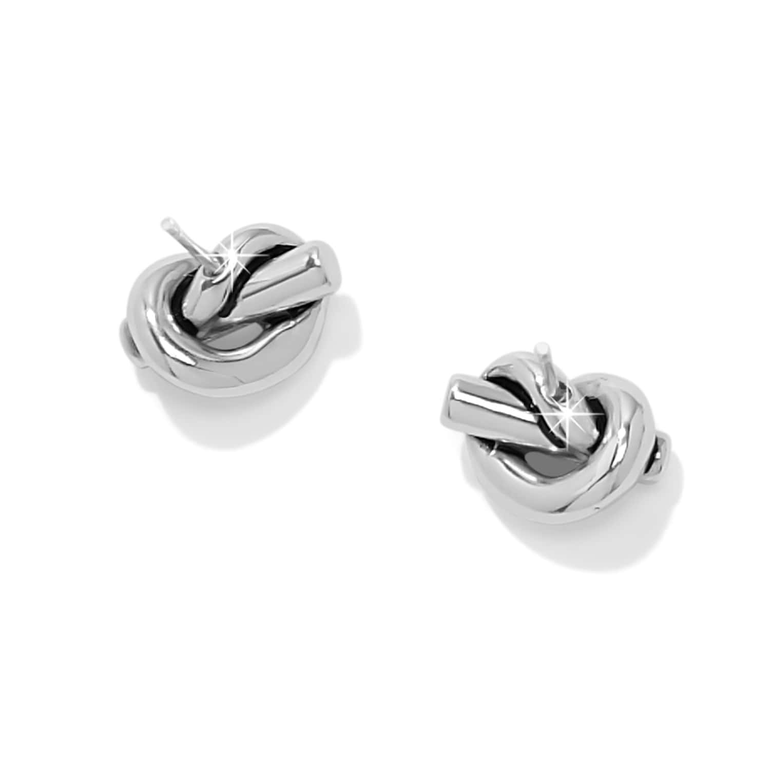 Pair of silver knot earrings on a white background