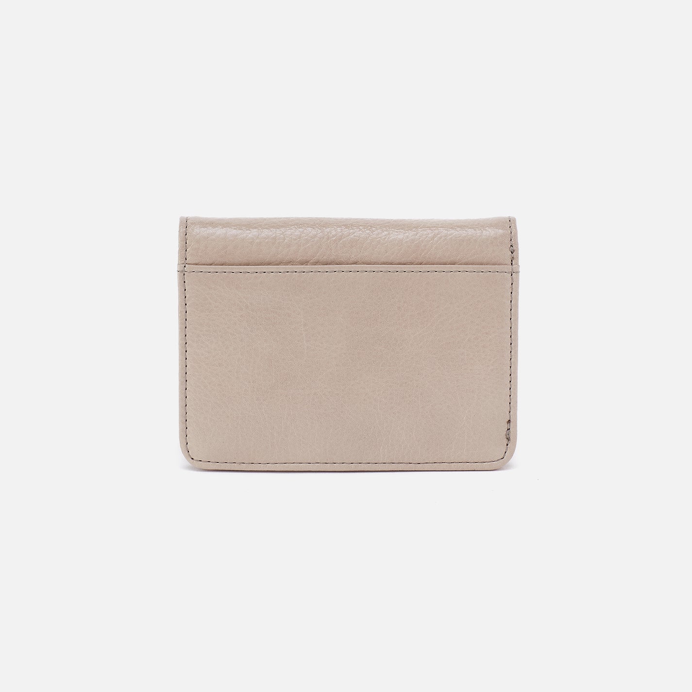 Back of the Jill Bi-Fold Wallet showing the exterior zip pocket in stone gloss leather.