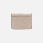 Back of the Jill Bi-Fold Wallet showing the exterior zip pocket in stone gloss leather.