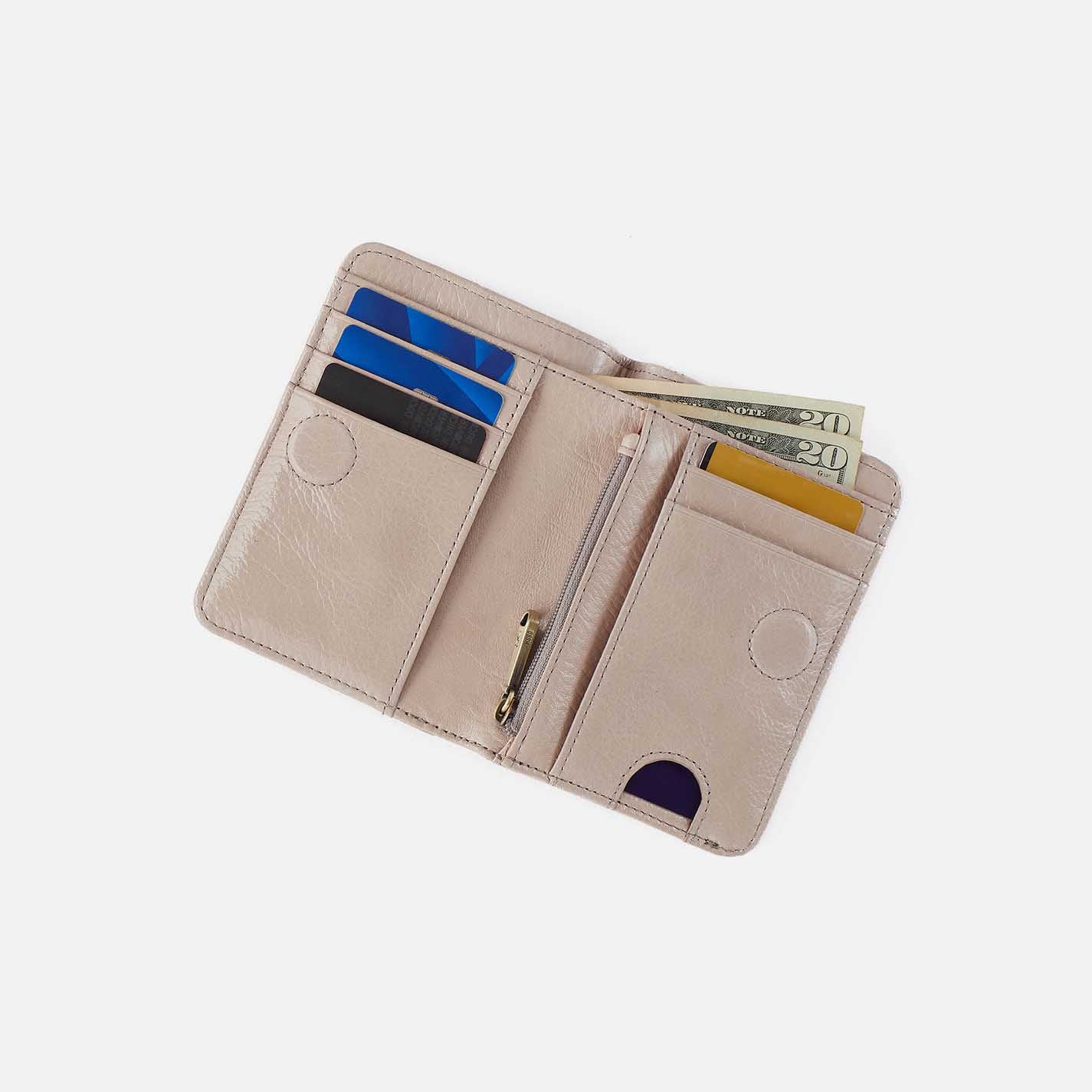 Interior view of the Jill Bi-Fold Wallet showing card slots, bill pocket.