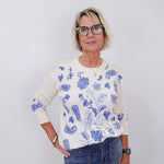 model wearing a cream johnny was daniela patchwork thermal long sleeve tee with blue floral and paisley print