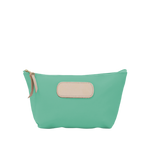Green pouch with beige patch on a white background