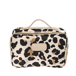 Leopard print toiletry bag with beige handle on a white background