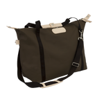 Brown bag with black straps on a white background