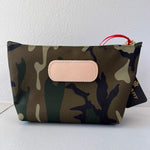 Camouflage pouch with beige flap on a white background