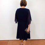 Joseph Ribkoff navy fit and flare dress with v-neckline.