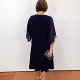 Joseph Ribkoff navy fit and flare dress with v-neckline.