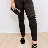 Woman wearing Joseph Ribkoff geometric straight pull-on pant against white background.