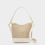 Woven handbag with beige strap on a white background
