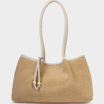 Woven handbag with rope handle on a white background