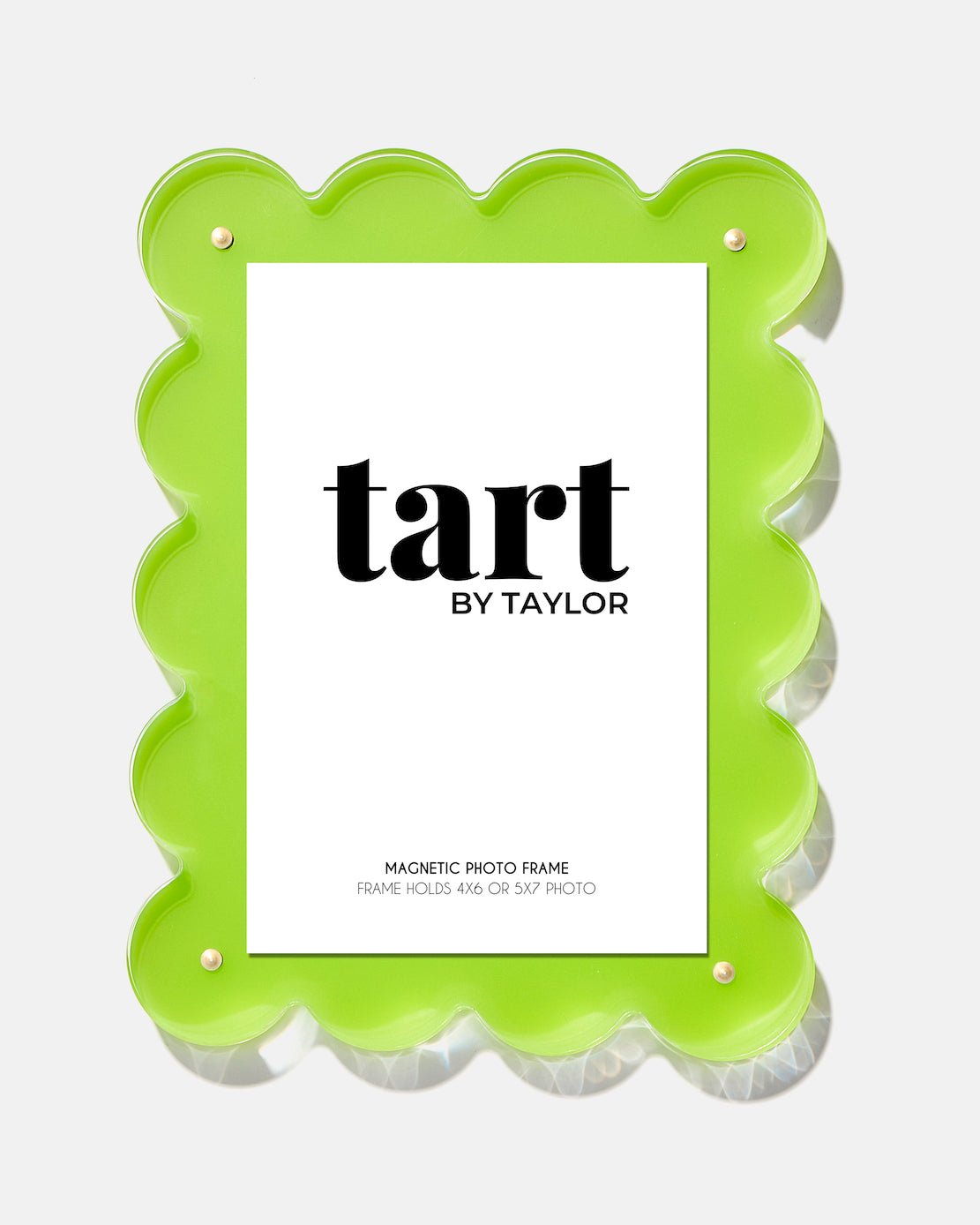 Green scalloped photo frame with 'tart by Taylor' branding on a white background