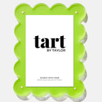 Green scalloped photo frame with 'tart by Taylor' branding on a white background