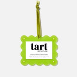 Green photo frame ornament with 'tart by Taylor' branding on a white background