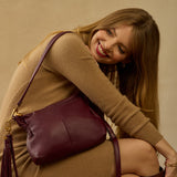 Mulberry glaze Hobo Kori Crossbody made from pebbled leather with sleek, structured design