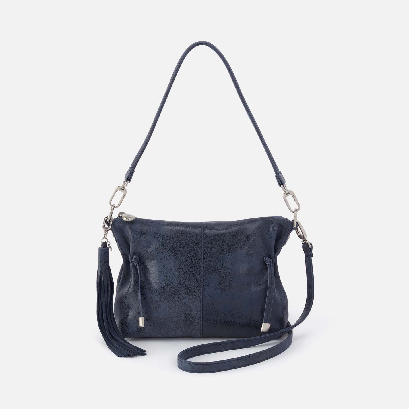 Navy blue handbag with a strap on a light gray background
