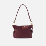 Mulberry glaze Hobo Kori Crossbody made from pebbled leather with sleek, structured design
