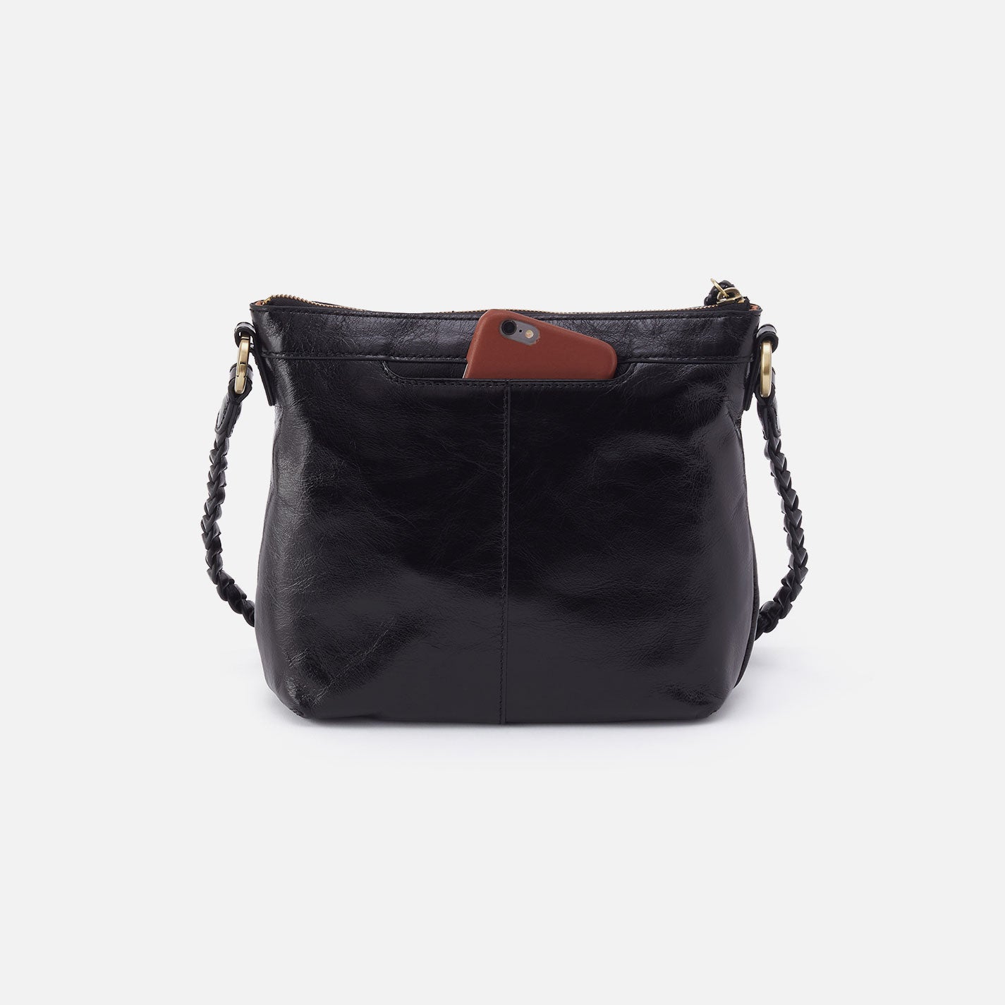 a black hobo medium crossbody against a white background. 