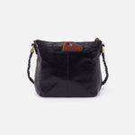a black hobo medium crossbody against a white background. 