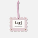 Pink photo frame ornament with 'tart by Taylor' branding on a white background