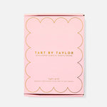 Pink packaging of Tart by Taylor scalloped acrylic photo frame on a white background