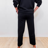 women modeling black pull on wide leg pants 