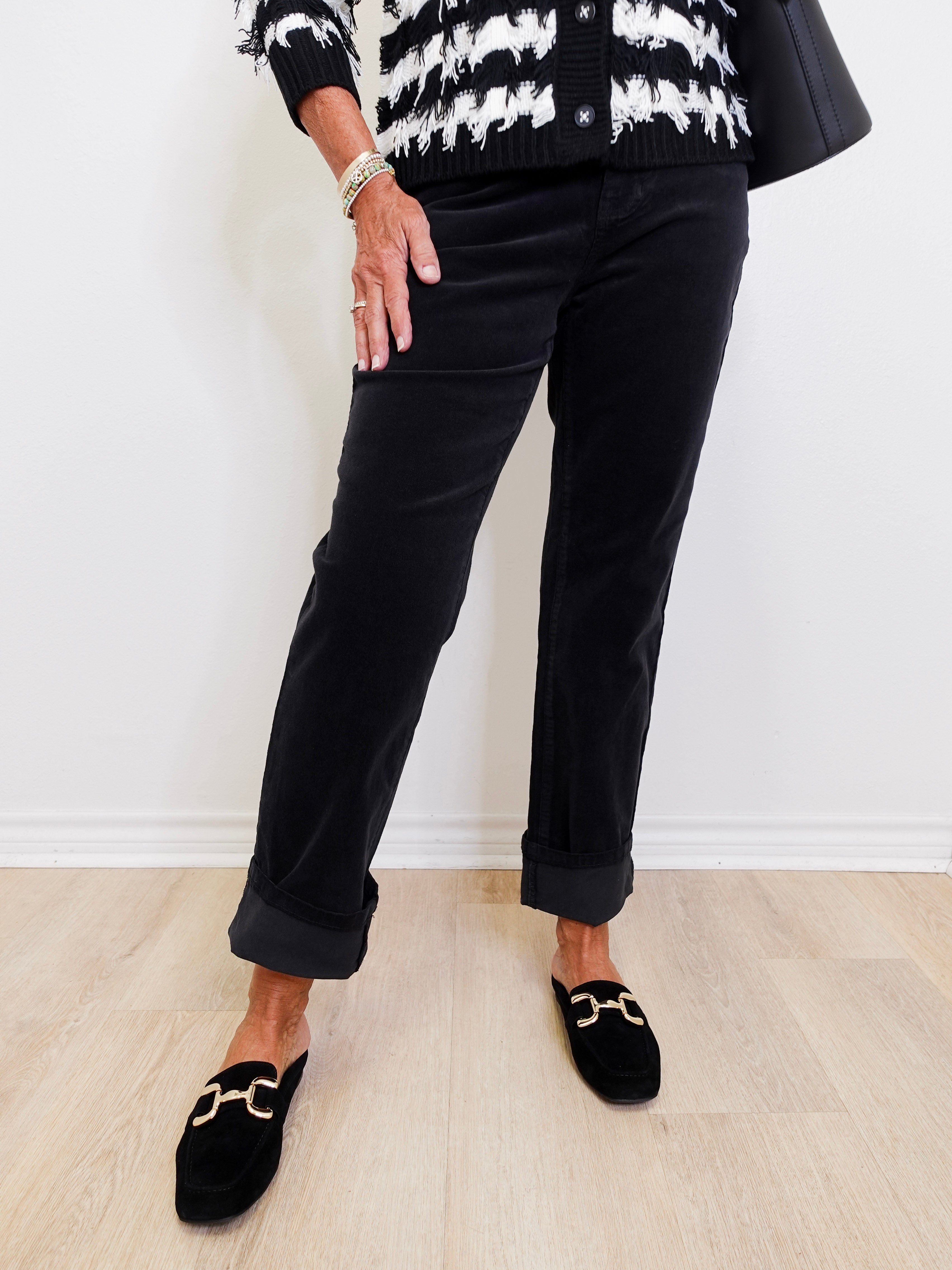 woman modeling black liverpool corduroy Markey girlfriend jeans against a white background. 