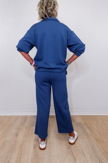 Casual Liverpool pacific blue pull-on wide leg cropped pants worn by woman against white backdrop